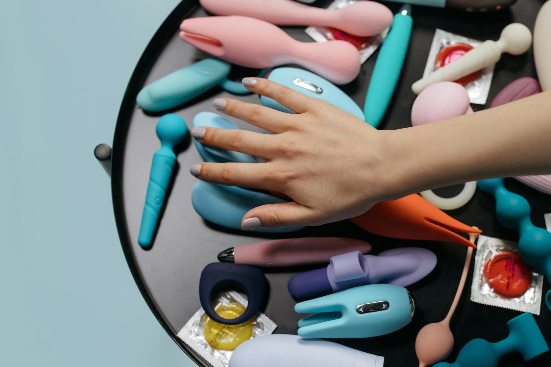 Fresh lemon halves on a pink background catching sunlight, symbolizing renewed vitality and sensation